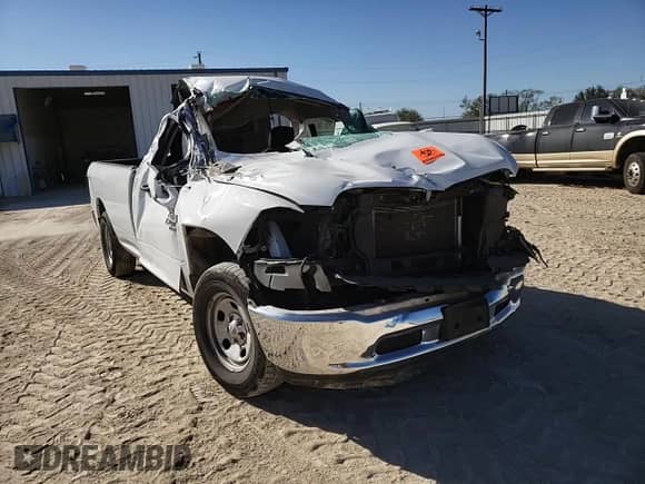 2020 Ram 1500 Tradesman with VIN 3C6JR6DT9LG189823, listed as a Copart auction lot 77557314 with 64,279 mi miles and Salvage title. Bid and sale history available at DreamBid. Image 11.
