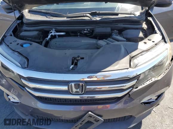 2018 Honda Pilot EX-L z VIN 5FNYF6H68JB062620, wystawiony jako Copart lot #64461045 z przebiegiem 61 021 mil mil oraz Szkoda całkowita • Salvage title. Historia ofert i sprzedaży dostępna na DreamBid. Obrazek 12.