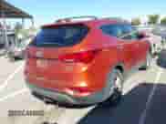 2017 Hyundai Santa Fe 2.4L z VIN 5XYZTDLB1HG443833, wystawiony jako IAAI lot #42908168 z przebiegiem 137 312 mil mil oraz . Historia ofert i sprzedaży dostępna na DreamBid. Obrazek 4.