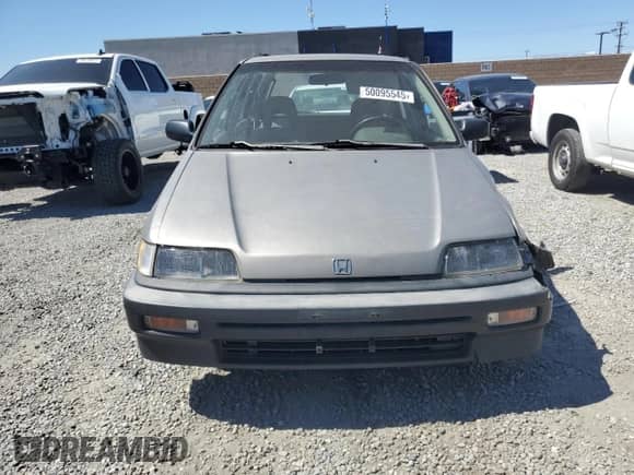 1990 Honda Civic with VIN JHMEE2752LS001520, listed as a Copart auction lot 50095545 with 456,252 mi miles and Salvage title. Bid and sale history available at DreamBid. Image 5.