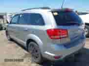 2019 Dodge Journey SE with VIN 3C4PDCBG0KT798004, listed as a IAAI auction lot 43012657 with 74,633 mi miles and . Bid and sale history available at DreamBid. Image 3.