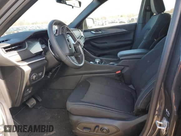 2025 Jeep Grand Cherokee Laredo with VIN 1C4RJHAG0SC268997, listed as a Copart auction lot 45860945 with 1,036 mi miles and Salvage title. Bid and sale history available at DreamBid. Image 7.