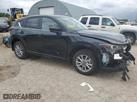 2025 Mazda CX-5 S Preferred with VIN JM3KFBCL6S0593804, listed as a Copart auction lot 65023055 with 4,037 mi miles and Salvage title. Bid and sale history available at DreamBid. Image 4.