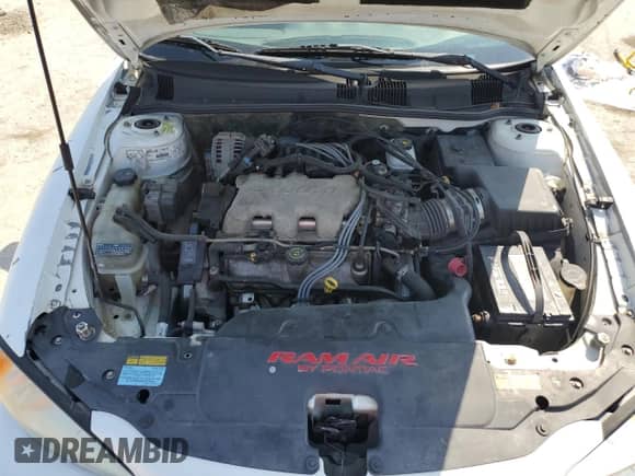 2001 Pontiac Grand Am GT z VIN 1G2NW12E71M649960, wystawiony jako Copart lot #83866485 z przebiegiem 171 015 mil mil oraz Szkoda całkowita • Salvage title. Historia ofert i sprzedaży dostępna na DreamBid. Obrazek 11.