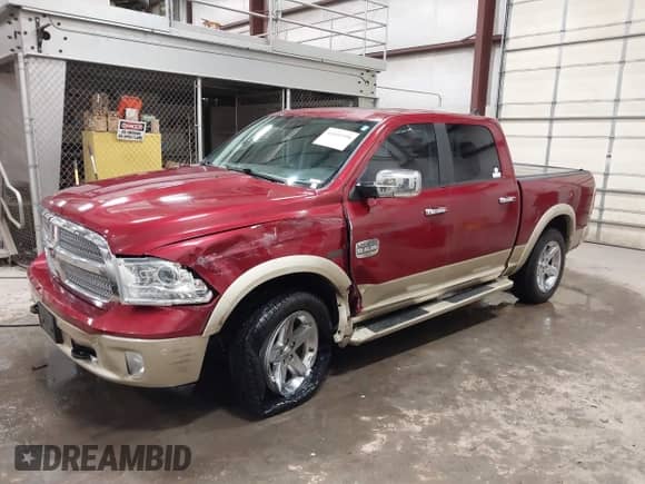 2015 Ram 1500 Laramie Longhorn with VIN 1C6RR7PM0FS532044, listed as a IAAI auction lot 41601998 with 117,649 mi miles and . Bid and sale history available at DreamBid. Image 17.