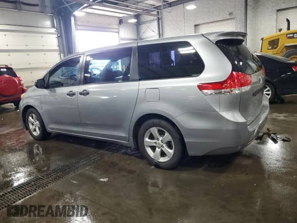 2012 Toyota Sienna with VIN 5TDZK3DC3CS240569, listed as a Copart auction lot 63664415 with 129,329 mi miles and Salvage title. Bid and sale history available at DreamBid. Image 2.