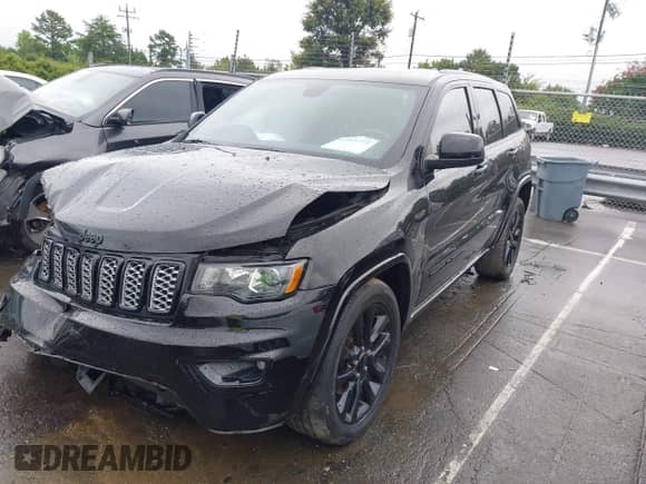 2020 Jeep Grand Cherokee Laredo E with VIN 1C4RJEAG3LC372299, listed as a IAAI auction lot 42915775 with 92,823 mi miles and . Bid and sale history available at DreamBid. Image 2.
