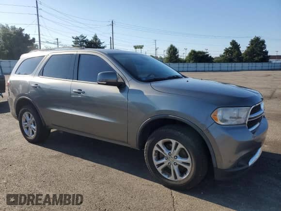 2012 Dodge Durango Crew z VIN 1C4RDJDG5CC112658, wystawiony jako Copart lot #70361875 z przebiegiem 215 458 mil mil oraz Czysty tytuł • Clean title. Historia ofert i sprzedaży dostępna na DreamBid. Obrazek 4.