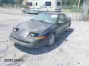 1994 Saturn SC с VIN 1G8ZG1579RZ306891, выставлен на аукционе IAAI как лот 42973172 с пробегом 141 233 миль миль и . История ставок и продаж доступна на DreamBid. Изображение 2.