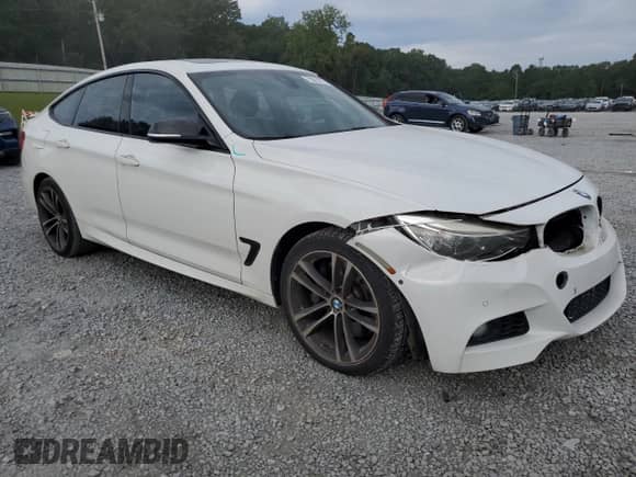 2015 BMW 3 Series 335i Gran Turismo xDrive with VIN WBA3X9C59FD868761, listed as a Copart auction lot 70922075 with 94,491 mi miles and Salvage title. Bid and sale history available at DreamBid. Image 4.