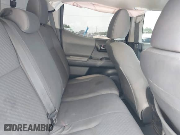 2022 Toyota Tacoma TRD Off Road with VIN 3TMCZ5ANXNM520138, listed as a IAAI auction lot 42713936 with 67,002 mi miles and . Bid and sale history available at DreamBid. Image 8.