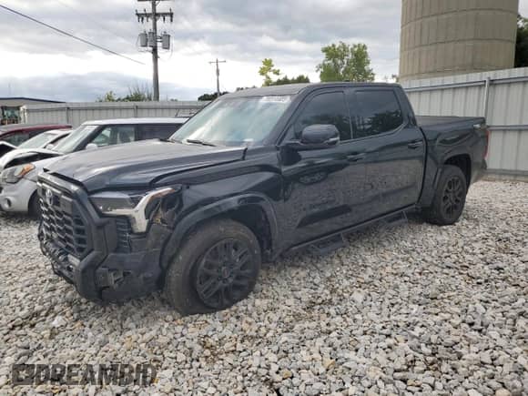 2023 Toyota Tundra SR5 with VIN 5TFLA5DB9PX065434, listed as a Copart auction lot 70314405 with 49,067 mi miles and Salvage title. Bid and sale history available at DreamBid. Image 1.