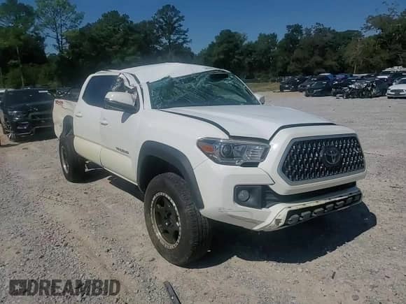 2019 Toyota Tacoma TRD Off Road z VIN 3TMCZ5AN9KM282522, wystawiony jako Copart lot #85939905 z przebiegiem 89 447 mil mil oraz Nie do naprawy • Non repairable. Historia ofert i sprzedaży dostępna na DreamBid. Obrazek 13.