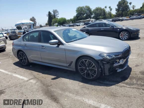 2023 BMW 5 Series 530i with VIN WBA53BH09PWX90206, listed as a Copart auction lot 59050975 with 18,331 mi miles and Salvage title. Bid and sale history available at DreamBid. Image 4.