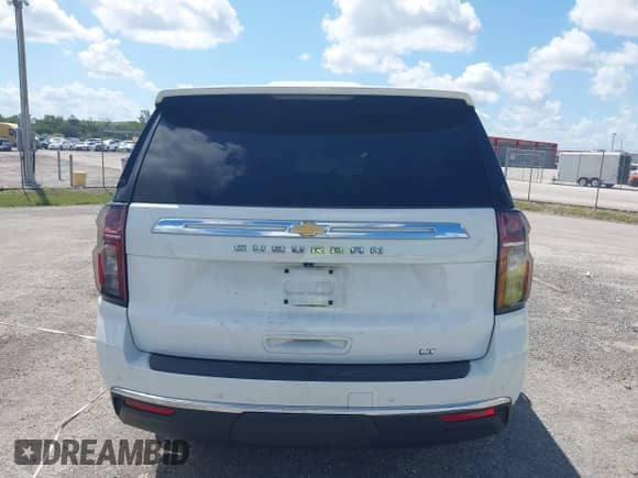 2021 Chevrolet Suburban LT z VIN 1GNSCCKD4MR308637, wystawiony jako IAAI lot #41275312 z przebiegiem 84 833 mil mil oraz . Historia ofert i sprzedaży dostępna na DreamBid. Obrazek 17.