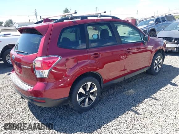 2018 Subaru Forester Premium z VIN JF2SJAGC0JH428568, wystawiony jako IAAI lot #42908934 z przebiegiem 147 546 mil mil oraz . Historia ofert i sprzedaży dostępna na DreamBid. Obrazek 4.