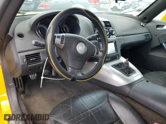 2007 Saturn Sky Red Line с VIN 1G8MG35X77Y128438, выставлен на аукционе Copart как лот 69835584 с пробегом 87 909 миль миль и Списание • Salvage title. История ставок и продаж доступна на DreamBid. Изображение 8.