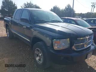2008 Dodge Dakota Laramie with VIN 1D7HW58N58S602817, listed as a IAAI auction lot 41906682 with 130,868 mi miles and . Bid and sale history available at DreamBid. Image 1.