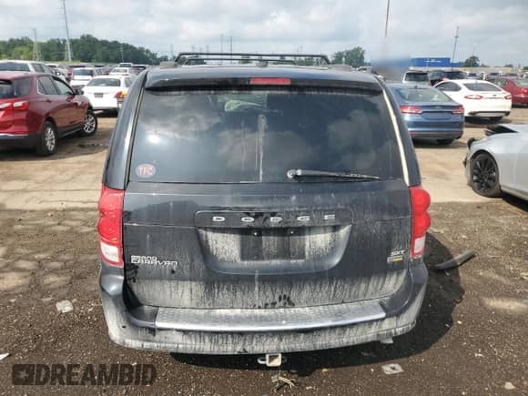 2017 Dodge Grand Caravan SXT with VIN 2C4RDGCG5HR581154, listed as a Copart auction lot 66502705 with 169,490 mi miles and Salvage title. Bid and sale history available at DreamBid. Image 6.
