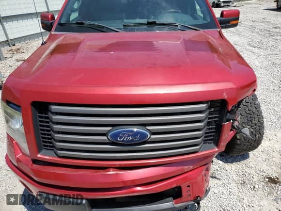 2012 Ford F-150 FX4 with VIN 1FTFW1ET7CFC91874, listed as a Copart auction lot 68002945 with 216,167 mi miles and Salvage title. Bid and sale history available at DreamBid. Image 11.
