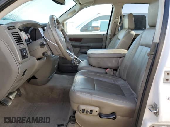 2009 Dodge RAM with VIN 3D3KR28L19G530857, listed as a Copart auction lot 87970845 with 123,487 mi miles and Salvage title. Bid and sale history available at DreamBid. Image 7.