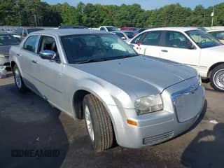 2009 Chrysler 300 LX with VIN 2C3KA43D59H614566, listed as a IAAI auction lot 42806434 with Not provided miles and . Bid and sale history available at DreamBid. Image 1.