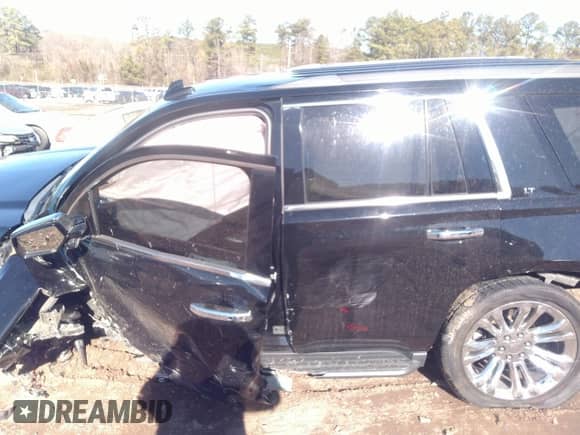 2019 Chevrolet Tahoe LT with VIN 1GNSKBKC0KR100255, listed as a IAAI auction lot 38349950 with Not provided miles and . Bid and sale history available at DreamBid. Image 14.