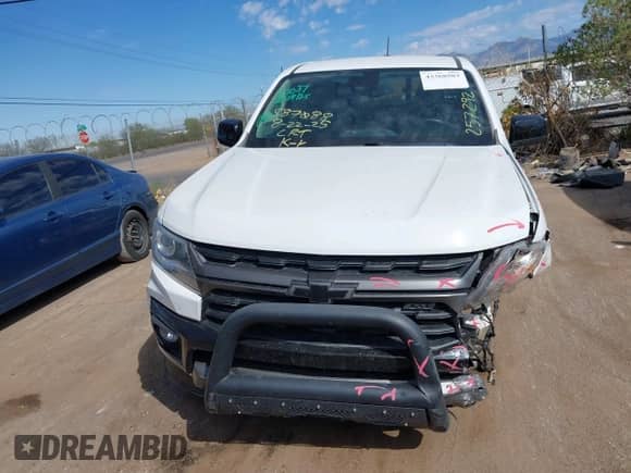 2021 Chevrolet Colorado 4WD Z71 z VIN 1GCGTDEN4M1257292, wystawiony jako IAAI lot #43368583 z przebiegiem 67 924 mil mil oraz . Historia ofert i sprzedaży dostępna na DreamBid. Obrazek 13.