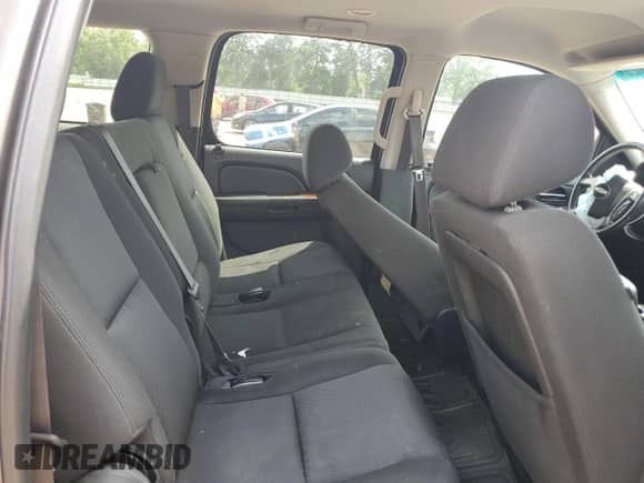 2013 Chevrolet Suburban LS with VIN 1GNSCHE00DR221307, listed as a Copart auction lot 54684925 with 203,169 mi miles and Salvage title. Bid and sale history available at DreamBid. Image 11.