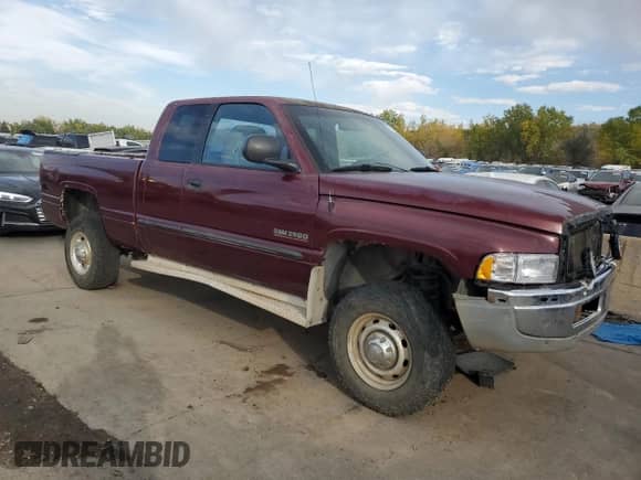 2000 Dodge 2500 with VIN 3B7KF2368YG140680, listed as a Copart auction lot 75522534 with 430,776 mi miles and Salvage title. Bid and sale history available at DreamBid. Image 4.