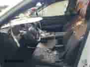 2022 Hyundai Tucson SEL Convenience with VIN KM8JFCA10NU040490, listed as a IAAI auction lot 43153756 with 18,274 mi miles and . Bid and sale history available at DreamBid. Image 5.