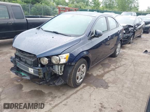 2015 Chevrolet Sonic LS with VIN 1G1JA5SH4F4129855, listed as a IAAI auction lot 42738481 with 48,004 mi miles and . Bid and sale history available at DreamBid. Image 2.