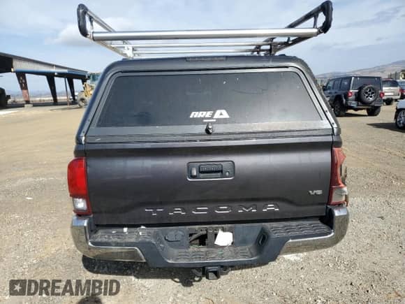 2018 Toyota Tacoma SR5 with VIN 5TFRZ5CN2JX063112, listed as a Copart auction lot 79125934 with 93,487 mi miles and Non repairable. Bid and sale history available at DreamBid. Image 6.