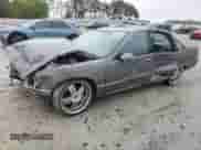 1991 Chevrolet Caprice с VIN 1G1BN53E1MW223013, выставлен на аукционе Copart как лот 49857604 с пробегом 224 278 миль миль и Списание • Salvage title. История ставок и продаж доступна на DreamBid. Изображение 1.