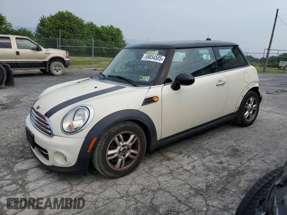 2013 MINI Hardtop with VIN WMWSU3C50DT683566, listed as a Copart auction lot 59854505 with 136,288 mi miles and Salvage title. Bid and sale history available at DreamBid. Image 1.