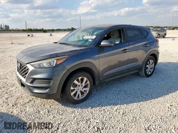 2019 Hyundai Tucson SE z VIN KM8J2CA43KU935537, wystawiony jako Copart lot #85107585 z przebiegiem 159 592 mil mil oraz Czysty tytuł • Clean title. Historia ofert i sprzedaży dostępna na DreamBid. Obrazek 1.
