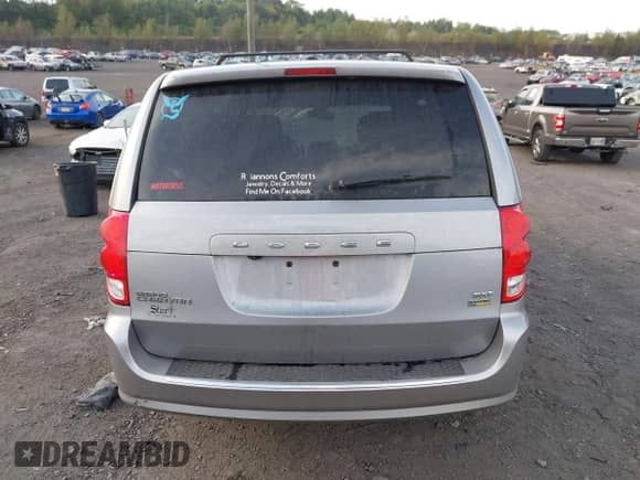2019 Dodge Grand Caravan SXT with VIN 2C4RDGCG7KR750856, listed as a IAAI auction lot 43218902 with 118,798 mi miles and . Bid and sale history available at DreamBid. Image 16.