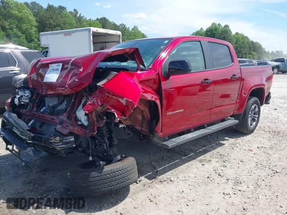 2021 Chevrolet Colorado 4WD Z71 z VIN 1GCGTDEN4M1197644, wystawiony jako IAAI lot #42206486 z przebiegiem 38 107 mil mil oraz . Historia ofert i sprzedaży dostępna na DreamBid. Obrazek 23.