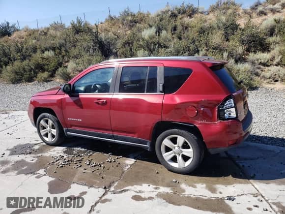 2014 Jeep Compass Sport with VIN 1C4NJDBB8ED567758, listed as a Copart auction lot 67984065 with 123,788 mi miles and Salvage title. Bid and sale history available at DreamBid. Image 2.