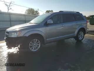 2016 Dodge Journey SXT with VIN 3C4PDCBG9GT224413, listed as a Copart auction lot 84042885 with 201,889 mi miles and Salvage title. Bid and sale history available at DreamBid. Image 1.