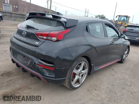 2022 Hyundai Veloster z VIN KMHT36AH0NU015217, wystawiony jako IAAI lot #42297323 z przebiegiem Nie podano mil oraz . Historia ofert i sprzedaży dostępna na DreamBid. Obrazek 4.