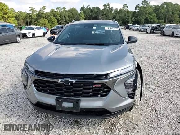 2025 Chevrolet Trax 2RS с VIN KL77LJEP1SC009404, выставлен на аукционе Copart как лот 71652615 с пробегом 26 741 миль миль и Списание • Salvage title. История ставок и продаж доступна на DreamBid. Изображение 14.