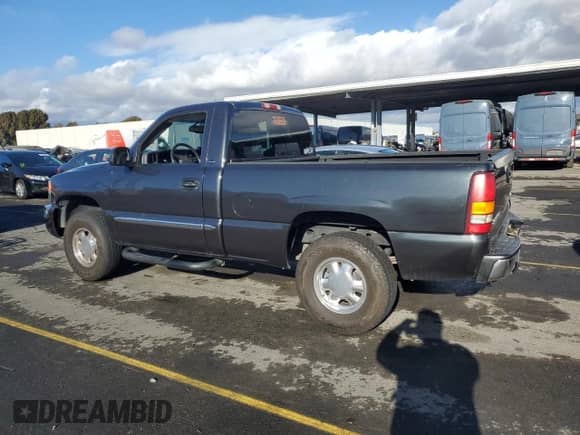 2003 GMC Sierra 1500 SLE z VIN 1GTEK14V23Z254997, wystawiony jako Copart lot #80293904 z przebiegiem 242 384 mil mil oraz Szkoda całkowita • Salvage title. Historia ofert i sprzedaży dostępna na DreamBid. Obrazek 2.