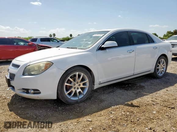 2009 Chevrolet Malibu LTZ with VIN 1G1ZK57739F105314, listed as a Copart auction lot 61207285 with 215,794 mi miles and Salvage title. Bid and sale history available at DreamBid. Image 1.
