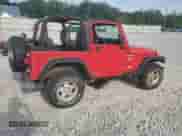 2000 Jeep Wrangler Sport z VIN 1J4FA49S6YP795653, wystawiony jako Copart lot #67831125 z przebiegiem 213 754 mil mil oraz Czysty tytuł • Clean title. Historia ofert i sprzedaży dostępna na DreamBid. Obrazek 3.