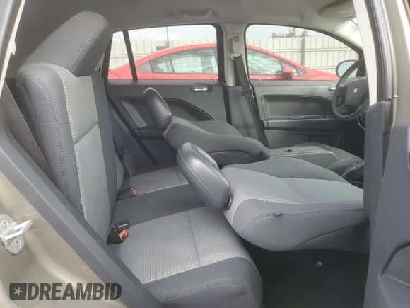 2008 Dodge Caliber SXT z VIN 1B3HB48B38D655284, wystawiony jako Copart lot #85874205 z przebiegiem 157 306 mil mil oraz Szkoda całkowita • Salvage title. Historia ofert i sprzedaży dostępna na DreamBid. Obrazek 10.