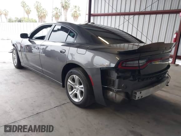 2022 Dodge Charger SXT with VIN 2C3CDXBG6NH161383, listed as a IAAI auction lot 43355583 with 57,196 mi miles and . Bid and sale history available at DreamBid. Image 3.