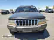 2001 Jeep Grand Cherokee Laredo с VIN 1J4GW48S01C704008, выставлен на аукционе Copart как лот 66754445 с пробегом 173 445 миль миль и Списание • Salvage title. История ставок и продаж доступна на DreamBid. Изображение 5.