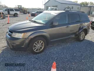 2014 Dodge Journey SXT with VIN 3C4PDCBG9ET142064, listed as a Copart auction lot 84588885 with 168,463 mi miles and Salvage title. Bid and sale history available at DreamBid. Image 1.