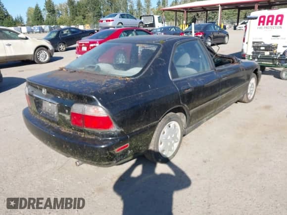 1997 Honda Accord LX with VIN 1HGCD5635VA220267, listed as a IAAI auction lot 43246438 with 260,776 mi miles and . Bid and sale history available at DreamBid. Image 4.